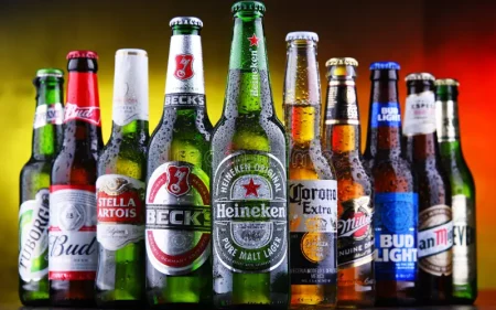 Assorted bottles of beer representing the diverse selection of 27 new varieties launched in Telangana.